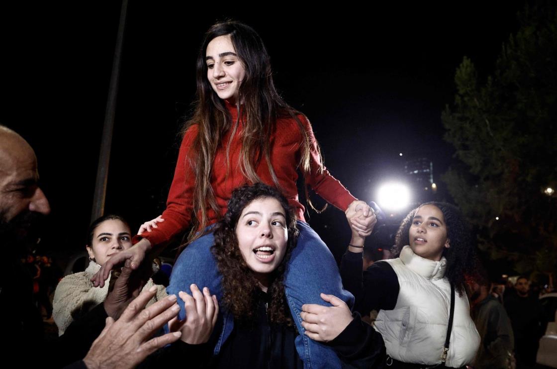 Newly released Palestinian priso<em></em>ner Rouba Assi is carried by supporters during a welcome ceremony in Ramallah, occupied West Bank, Nov. 28, 2023. ()