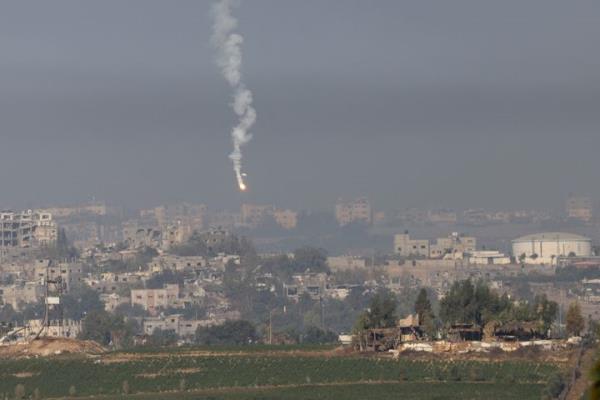 A picture taken from the southern Israeli city of Sderot on Oct. 26, 2023, shows flares fired by the Israeli army over the northern Gaza Strip, amid the o<em></em>ngoing war with the Palestinian group Hamas.