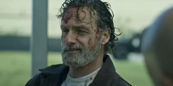 A bloody Rick Grimes (Andrew Lincoln) smirks in The Walking Dead - The o<em></em>nes Who Live