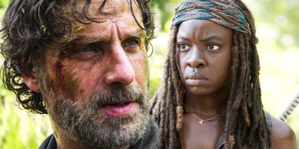 Andrew Lincoln as Rick Grimes looking off to the side and Danai Gurira as Micho<em></em>nne looking serious in The Walking Dead.