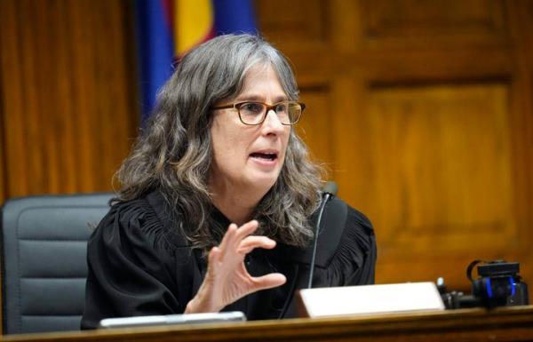 Judge Sarah B. Wallace presides over closing arguments in a hearing for a lawsuit to keep former President Do<em></em>nald Trump off the state ballot, Wednesday, Nov. 15, 2023, in Denver. (AP Photo/Jack Dempsey, Pool)