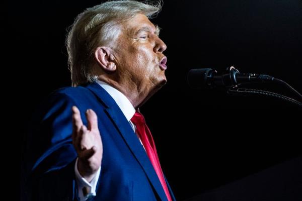 Former President Do<em></em>nald Trump speaks at a Nov. 8 campaign rally in Hialeah, Florida, while other Republican presidential candidates were holding a debate in Miami.