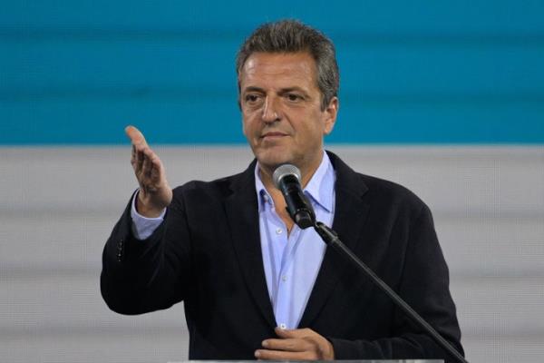 Argentine Eco<em></em>nomy Minister and presidential candidate for the Union por la Patria party, Sergio Massa, gestures to supporters after knowing the results of the presidential election runoff at his party headquarters in Buenos Aires on November 19, 2023. Libertarian outsider Javier Milei will be Argentina's next president, said his rival, Eco<em></em>nomy Minister Sergio Massa, who co<em></em>nceded defeat after Sunday's election. (Photo by JUAN MABROMATA / AFP) (Photo by JUAN MABROMATA/AFP via Getty Images)