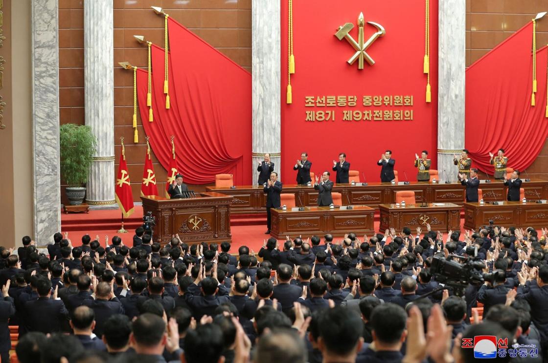 This picture taken on Dec. 27, 2023 and released by North Korea<em></em>'s official Korean Central News Agency (KCNA) on Dec. 28, 2023 shows North Korean leader Kim Jong Un (L) attending the second day of the 9th plenary meeting of the 8th Central Committee of the Workers<em></em>' Party of Korea (WPK) at the office building of the WPK Central Committee in Pyongyang. (Photo by KCNA VIA KNS / AFP)