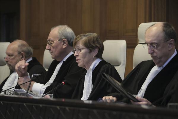 Presiding judge Joan Donoghue, centre, speaks during session at the Internatio<em></em>nal Court of Justice, or World Court, in The Hague, Netherlands, Friday, January 26, 2024.